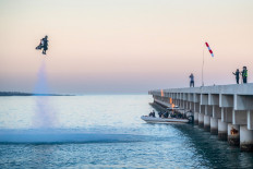 A handout picture released by the Expo 2020 on February 17, 2020, shows Vince Reffet, known as Jetman, taking part in a flight in the Emirati city of Dubai. 