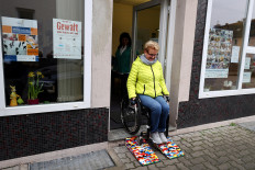 Rita Ebel, nicknamed 'Lego grandma', tests one of her wheelchair ramps built from donated Lego bricks in Hanau, Germany, on February 17, 2020. 