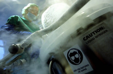 A doctor takes out preserved embryos in liquid nitrogen at the Eugin clinic in Barcelona, a center that specializes in assisted reproduction on June 18, 2008.