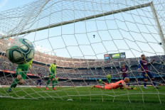 Messi scores four as Barca jump above defeated Madrid before Clasico