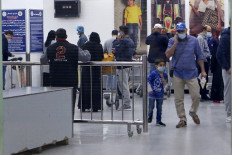 Market players see coronavirus triggering further risk-off moves