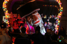 A float depicting am orthodox jew is paraded during the 'Zondagsstoet' on the opening day of the Aalst carnival on February 23, 2020, in Aalst. 