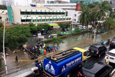 Flooding closed the Cempaka Putih area, Jakarta, Tuesday.