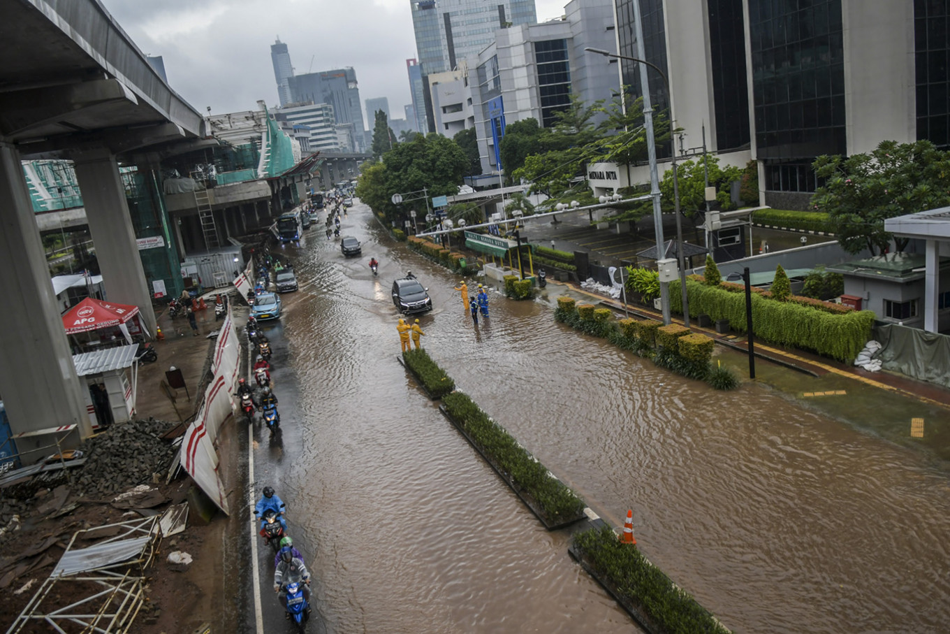 Widespread flooding in Greater Jakarta causes chaos for commuters