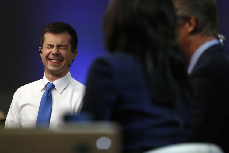 Democratic 2020 U.S. presidential candidate former South Bend Mayor Pete Buttigieg smiles during and interview in the spin room after the tenth Democratic 2020 presidential debate at the Gaillard Center in Charleston, South Carolina, U.S. February 25, 2020.