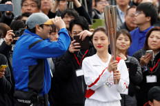 New start date for virus-delayed Olympic torch relay 		