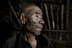 Myanmar's last generation of tattooed headhunters