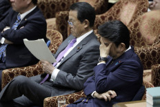 Taro Aso repeats claim that treated Fukushima water is good to drink