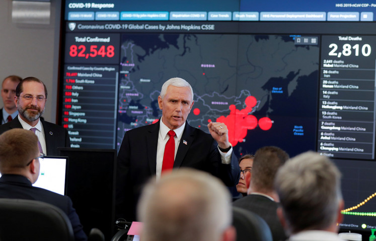 U.S. Vice President Mike Pence speaks next to Health and Human Services (HHS) Secretary Alex Azar  during a tour of the 