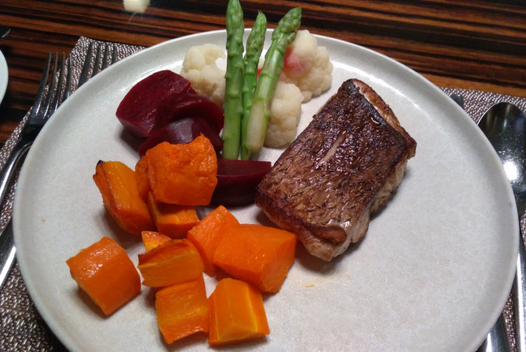 Dinner menu on the first day of Fairmont Fit Retreat; lightly-fried barramundi with carrots, asparagus, sweet potatoes, beets and cauliflowers. 
