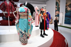 A kimono, 'Engagement Ribbon' by Japanese kimono designer Tamao Shigemune is displayed during the press preview of the 'Kimono: Kyoto to Catwalk' exhibition at the Victoria and Albert Museum in central London on February 26, 2020.
