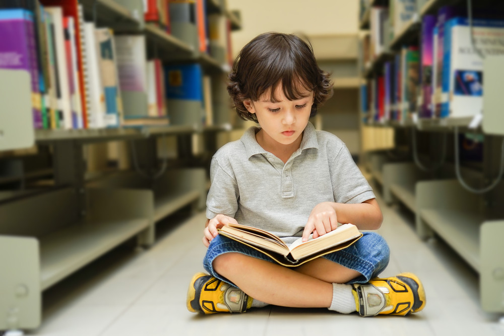 Reading a good book each day could boost kids’ academic performance