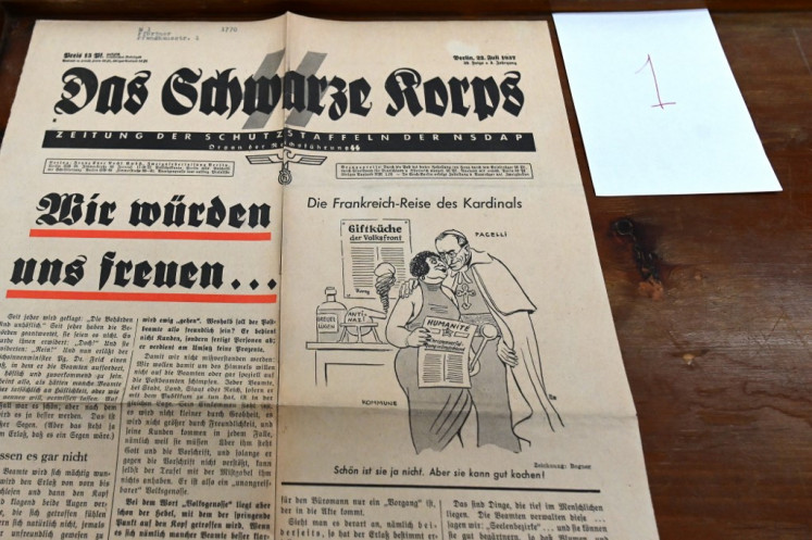 A picture taken on February 27, 2020 shows a copy of the SS newspaper 