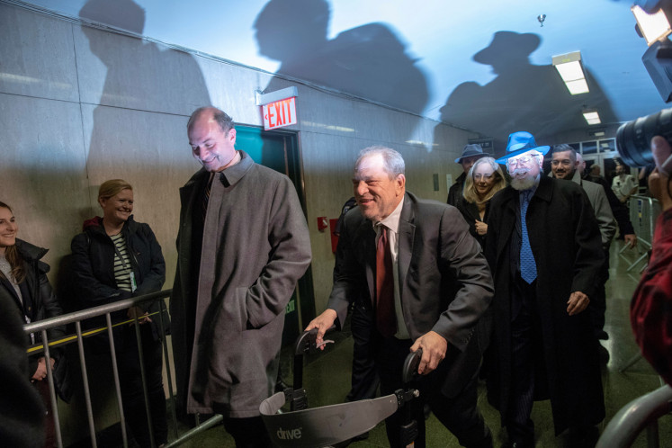 Harvey Weinstein departs New York Criminal Court after the third day of jury deliberations in his sexual assault trial in the Manhattan borough of New York City, New York, U.S., February 20, 2020.  