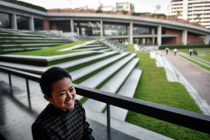 Architect Kotchakorn Voraakhom speaks to AFP about the Thammasat Urban Farming Green Roof at Thammasat University in Pathum Thani in Bangkok, Thailand, on February 7, 2020. 