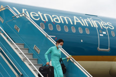  Vietnam flight attendant given suspended jail term for spreading Covid-19 