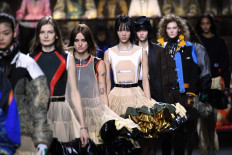 Vuitton hits high note with all-singing Paris fashion show