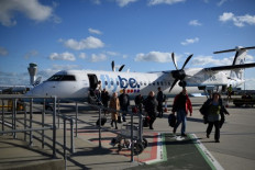 UK airline Flybe collapses as virus hits flights worldwide