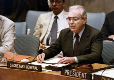 In this file photo taken on Aug. 8, 1988 UN Secretary General Javier Perez de Cuellar announces a cease-fire in the Iran-Iraq war will begin on Aug. 20 during a special session of the UN Security Council, at UN headquarters in New York. Perez de Cuellar died on Wednesday in Lima at the age of 100, his son reported.