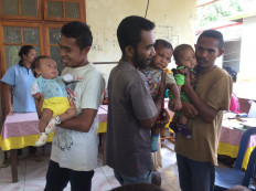 Fatherly love: Dads step up to plate for child health in East Flores