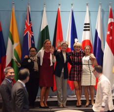 Foreign Minister Retno Marsudi (left, onstage) candidly poses together with other female foreign ministers of the European Union, South Korea, Australia and Canada at the ASEAN Regional Forum Retreat in Singapore in 2018.