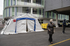 France bans gatherings of 1,000 over virus, two more MPs infected