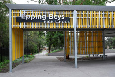 Two Australian schools close as coronavirus cases jump