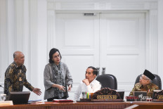 In fight against COVID-19, Jokowi taps VP to deal with what he knows best: Religion