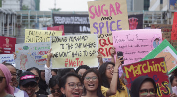 Peaceful march calls for sweeping changes on International Women&rsquo;s Day