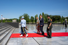 Dutch King Willem-Alexander (second right) and Queen Maxima (third right) prepare to lay a wreath during their visit to the Heroes Cemetery in Jakarta on March 10. 