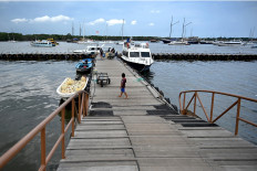 A general view shows a pier in Denpasar on Indonesia's resort island of Bali on March 8, 2020, from which fast boats travel to Nusa Penida island.