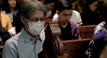 Jakarta Cathedral adjusts traditions to contain COVID-19 outbreak