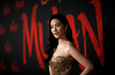 'Mulan' goes on, Bond waits as Hollywood tracks virus spread