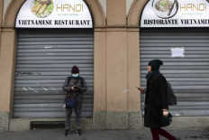 Italy shuts stores across country to fight virus