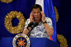 Philippine president orders virus lockdown of capital
