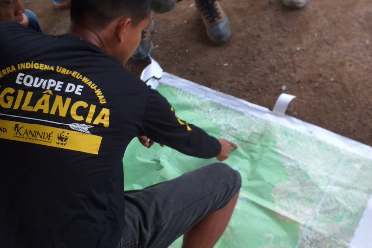 Bitate, a member of the Uru-Eu-Wau-Wau tribe, plans land inspections during a meeting held at Aldeia Nova, a village deep in the Amazon, Brazil, February 18, 2020. 