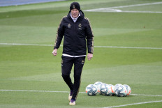 In this file photo taken on Feb.29 Real Madrid's French coach Zinedine Zidane attends a training session at the club's training ground in Valdebebas in the outskirts of Madrid on Feb.29 on the eve of the Spanish League football match between Real Madrid and Barcelona. Real Madrid went into quarantine on March 12 as La Liga announced Spain's top two divisions will be suspended for at least two weeks over the coronavirus.
