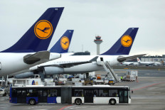 Airplanes of German carrier Lufthansa stand at the air terminal of Frankfurt Airport, Germany, on Thursday.   