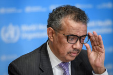 World Health Organization (WHO) Director-General Tedros Adhanom Ghebreyesus adjusts his glasses as he speaks during a daily press briefing on COVID-19 virus at the WHO headquaters in Geneva on March 9, 2020. 