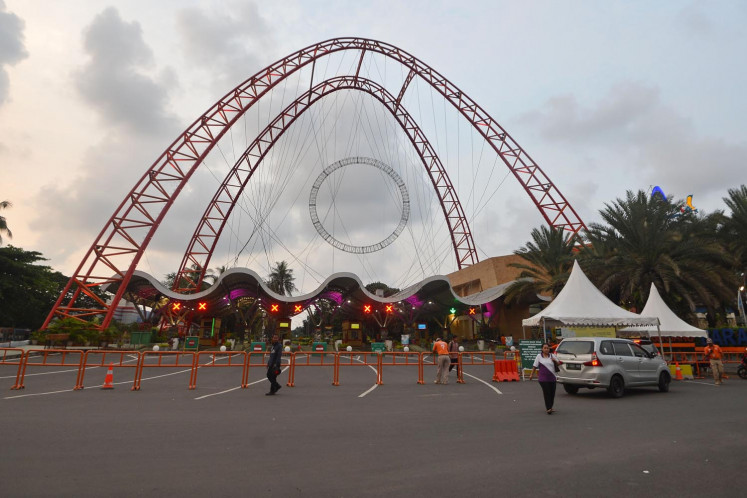 Security guards patrol Ancol Dreamland on Saturday following Jakarta Governor <a href=