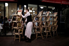 France's cafes opened through the war, but not the coronavirus