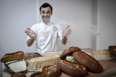 Italian founder of Pane Vivo Adriano Farano poses during a photo session on March 11, 2020 at the Pane Vivo bakery production site in Paris. 