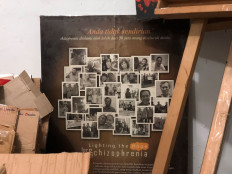 Showing support: A sign is displayed in the therapy room of the Indonesian Care for Schizophrenia (KPSI) community, a support group for people with schizophrenia and their families set up in 2011. 