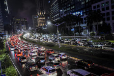 Jakarta plans to reimpose traffic policy once blamed for infections on public transit