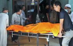 Indonesia records spike in COVID-19 deaths after days of central govt data confusion