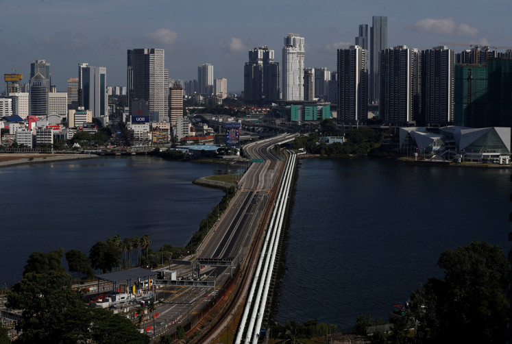 A view of the empty Woodlands Causeway between Singapore and Malaysia after Malaysia imposed a lockdown on travel due to the coronavirus disease (COVID-19) outbreak March 18, 2020.  