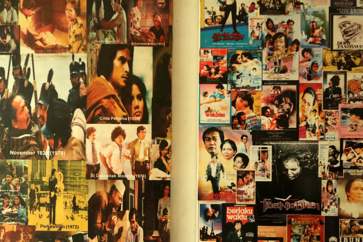 All-time greats: A collage of posters and stills of classic Indonesian films adorns a wall at Sinematek Indonesia, the first film archive in Southeast Asia.