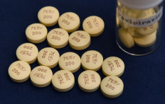 Anti-influenza Avigan Tablets produced by Japan's Fujifilm are displayed in Tokyo on Oct. 22, 2014. 