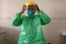 West Java hospital employees arrested for allegedly stealing hundreds of boxes of masks