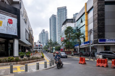 An unusually quiet road in a popular tourist area is pictured in Jakarta on March 18, as people stay home amid concerns of the COVID-19 outbreak. 